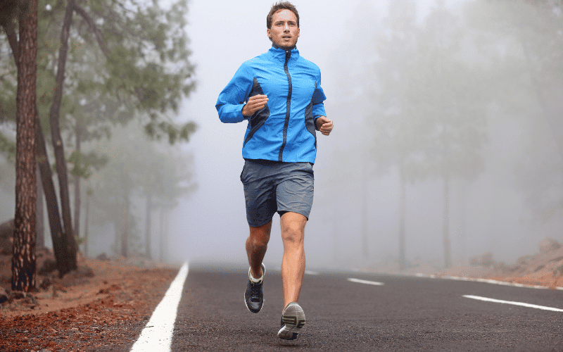 A runner on a trail, avoiding obstacles and using proper form to prevent injuries